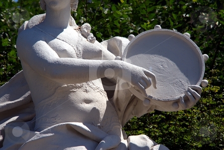 To use this stock image in your creative project, please select the size you need over to the right and click the "Add to Cart" button.
Your downloaded image will come with the Cutcaster watermark removed so don’t worry about the watermark you see on this page. Woman playing on tambourine detail stock photo, Detail of white statue of women playing on tambourine by Juraj Kovacik