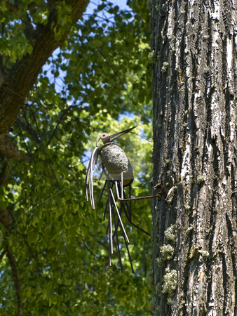 To use this stock image in your creative project, please select the size you need over to the right and click the "Add to Cart" button.
Your downloaded image will come with the Cutcaster watermark removed so don’t worry about the watermark you see on this page. Metal woodpecker stock photo, Metal figure of woodpecker on the tree by Sergej Razvodovskij