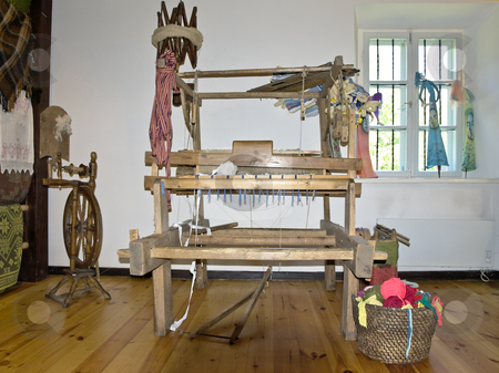 To use this stock image in your creative project, please select the size you need over to the right and click the "Add to Cart" button.
Your downloaded image will come with the Cutcaster watermark removed so don’t worry about the watermark you see on this page. Loom stock photo, Old wooden loom in the center of the room by Sergej Razvodovskij