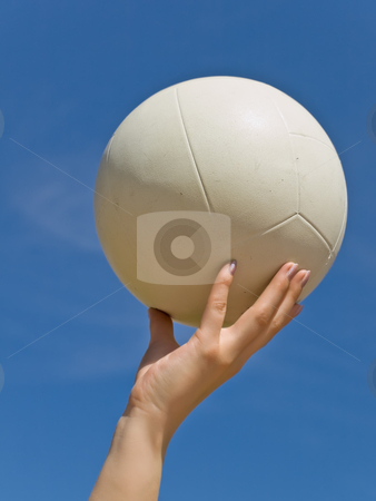 To use this stock image in your creative project, please select the size you need over to the right and click the "Add to Cart" button.
Your downloaded image will come with the Cutcaster watermark removed so don’t worry about the watermark you see on this page. Volleyball stock photo, White ball in the woman hand against the blue sky by Sergej Razvodovskij