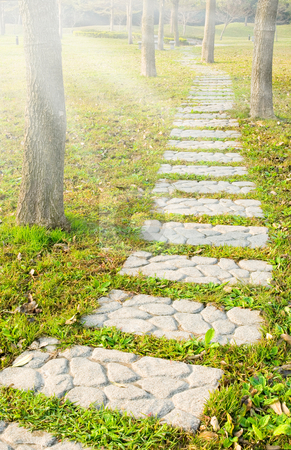 To use this stock image in your creative project, please select the size you need over to the right and click the "Add to Cart" button.
Your downloaded image will come with the Cutcaster watermark removed so don’t worry about the watermark you see on this page. Stone walkway stock photo, Stone walkway winding in park by Lawren