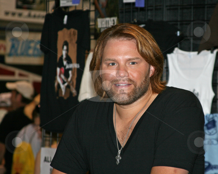 To use this stock image in your creative project, please select the size you need over to the right and click the "Add to Cart" button.
Your downloaded image will come with the Cutcaster watermark removed so don’t worry about the watermark you see on this page. James Otto - CMA Music Festival 2009 stock photo, James Otto at the CMA Music Festival June 11-14, 2009 in Nashville, Tennessee signing autographs by Dennis Crumrin