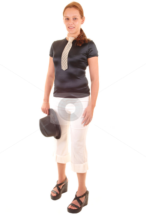 To use this stock image in your creative project, please select the size you need over to the right and click the "Add to Cart" button.
Your downloaded image will come with the Cutcaster watermark removed so don’t worry about the watermark you see on this page. Dressed up woman. stock photo, An all dressed up woman in black blouse and white trousers, with a hat in
her hand and a necktie made from white pearls, for white background. by Horst Petzold