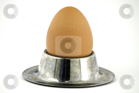 To use this stock image in your creative project, please select the size you need over to the right and click the "Add to Cart" button.
Your downloaded image will come with the Cutcaster watermark removed so don’t worry about the watermark you see on this page. Egg in a stand stock photo, by Arek Rainczuk