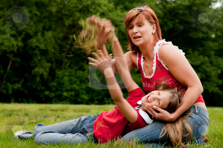 To use this stock image in your creative project, please select the size you need over to the right and click the "Add to Cart" button.
Your downloaded image will come with the Cutcaster watermark removed so don’t worry about the watermark you see on this page. Lets threw some grass stock photo, Mother and Daughter are happy in the park by Frenk and Danielle Kaufmann