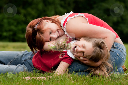 To use this stock image in your creative project, please select the size you need over to the right and click the "Add to Cart" button.
Your downloaded image will come with the Cutcaster watermark removed so don’t worry about the watermark you see on this page. We eating grass stock photo, Mother and Daughter are happy in the park by Frenk and Danielle Kaufmann