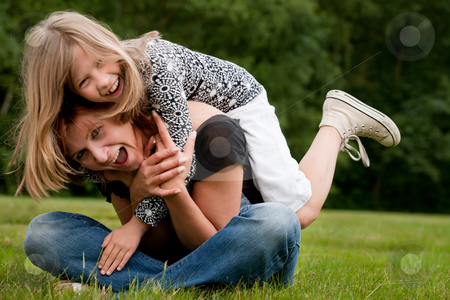 To use this stock image in your creative project, please select the size you need over to the right and click the "Add to Cart" button.
Your downloaded image will come with the Cutcaster watermark removed so don’t worry about the watermark you see on this page. Ride on my mama stock photo, Mother and Daughter are happy in the park by Frenk and Danielle Kaufmann