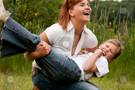 To use this stock image in your creative project, please select the size you need over to the right and click the "Add to Cart" button.
Your downloaded image will come with the Cutcaster watermark removed so don’t worry about the watermark you see on this page. Throw my girl stock photo, Mother and Daughter are happy in the park by Frenk and Danielle Kaufmann
