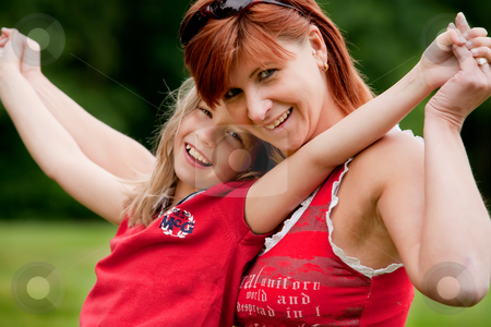 To use this stock image in your creative project, please select the size you need over to the right and click the "Add to Cart" button.
Your downloaded image will come with the Cutcaster watermark removed so don’t worry about the watermark you see on this page. We are so happy stock photo, Mother and Daughter are happy in the park by Frenk and Danielle Kaufmann
