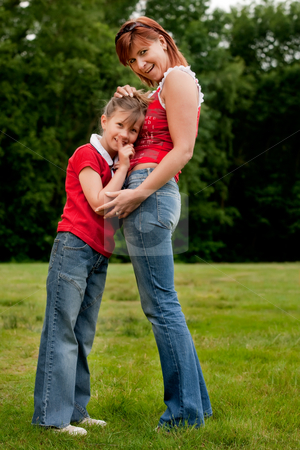 To use this stock image in your creative project, please select the size you need over to the right and click the "Add to Cart" button.
Your downloaded image will come with the Cutcaster watermark removed so don’t worry about the watermark you see on this page. Happy mother and daugther in red stock photo, Mother and Daughter are happy in the park by Frenk and Danielle Kaufmann