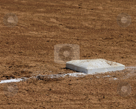 To use this stock image in your creative project, please select the size you need over to the right and click the "Add to Cart" button.
Your downloaded image will come with the Cutcaster watermark removed so don’t worry about the watermark you see on this page. 1st Base stock photo, Ist base on a softball diamond. by W. Paul Thomas