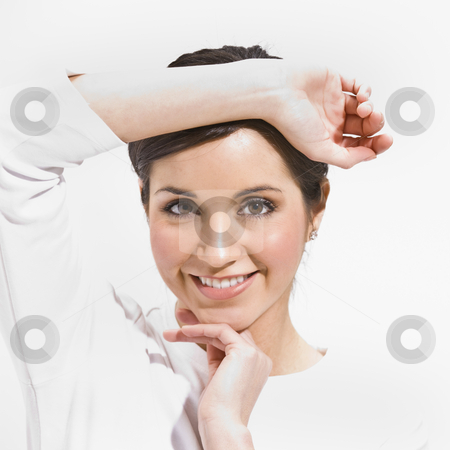 To use this stock image in your creative project, please select the size you need over to the right and click the "Add to Cart" button.
Your downloaded image will come with the Cutcaster watermark removed so don’t worry about the watermark you see on this page. Female Posing stock photo, An attractive female posing. She is framing her face with her hands and is smiling directly at the camera. Square framed shot. by Jonathan Ross