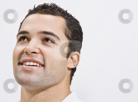 To use this stock image in your creative project, please select the size you need over to the right and click the "Add to Cart" button.
Your downloaded image will come with the Cutcaster watermark removed so don’t worry about the watermark you see on this page. Attractive Man Looking Up and Smiling stock photo, Attractive male head shot. He is smiling and looking up. Horizontal by Jonathan Ross