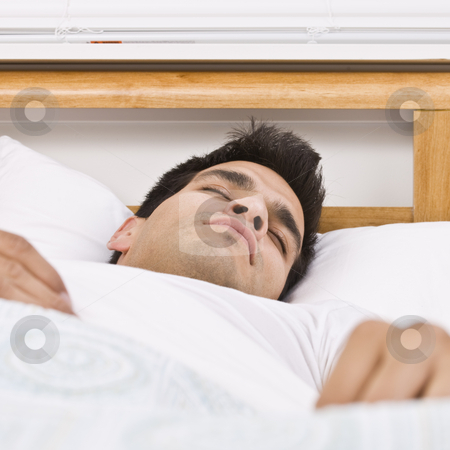 To use this stock image in your creative project, please select the size you need over to the right and click the "Add to Cart" button.
Your downloaded image will come with the Cutcaster watermark removed so don’t worry about the watermark you see on this page. Man Sleeping stock photo, A man sleeping in bed. Square framed shot. by Jonathan Ross