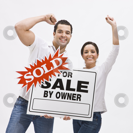 To use this stock image in your creative project, please select the size you need over to the right and click the "Add to Cart" button.
Your downloaded image will come with the Cutcaster watermark removed so don’t worry about the watermark you see on this page. Couple with FSBO home sold sign. stock photo, Happy Couple with sold sign for home pumping their fists in the air in celebration. Square composition. by Jonathan Ross