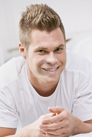 To use this stock image in your creative project, please select the size you need over to the right and click the "Add to Cart" button.
Your downloaded image will come with the Cutcaster watermark removed so don’t worry about the watermark you see on this page. Close Up Portrait of an Attractive male face. stock photo, Attractive male lying down. Head shot, vertically framed photo. by Jonathan Ross