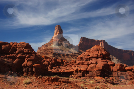To use this stock image in your creative project, please select the size you need over to the right and click the "Add to Cart" button.
Your downloaded image will come with the Cutcaster watermark removed so don’t worry about the watermark you see on this page. Canyonlands National PARK stock photo, View of the red rock formations in Canyonlands National Park with blue sky by Mark Smith