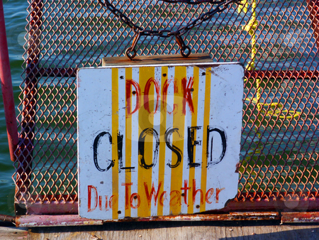 To use this stock image in your creative project, please select the size you need over to the right and click the "Add to Cart" button.
Your downloaded image will come with the Cutcaster watermark removed so don’t worry about the watermark you see on this page. Dock Closed stock photo, A