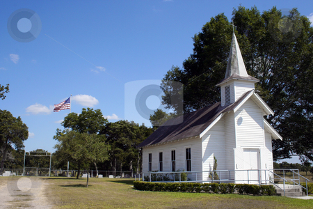 To use this stock image in your creative project, please select the size you need over to the right and click the "Add to Cart" button.
Your downloaded image will come with the Cutcaster watermark removed so don’t worry about the watermark you see on this page. Small Rural Church in Texas stock photo, A small rural church in Texas. There is a cemetary and a large oak tree behind the church. by Brandon Seidel