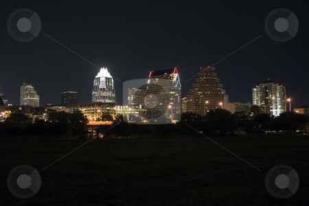 To use this stock image in your creative project, please select the size you need over to the right and click the "Add to Cart" button.
Your downloaded image will come with the Cutcaster watermark removed so don’t worry about the watermark you see on this page. Downtown Austin, Texas at Night stock photo, A very pretty night in Austin, Texas. This shot was taken from across Town Lake downtown. A very useful image for Austin related content. by Brandon Seidel