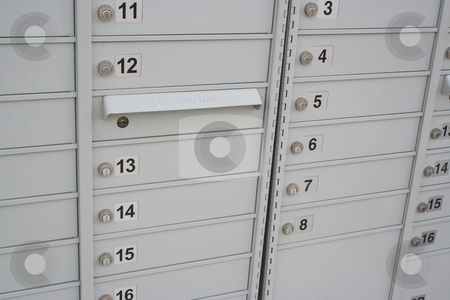 To use this stock image in your creative project, please select the size you need over to the right and click the "Add to Cart" button.
Your downloaded image will come with the Cutcaster watermark removed so don’t worry about the watermark you see on this page. Community Mailboxes stock photo, A shot of some new mailboxes in a neighborhood. The boxes are letter size and numbered. One box is for outgoing mail. by Brandon Seidel