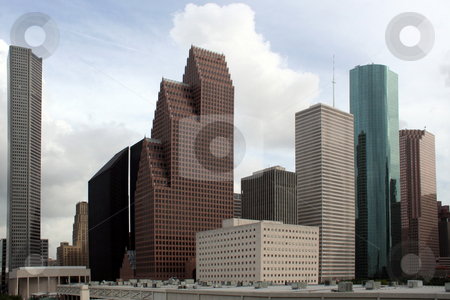 To use this stock image in your creative project, please select the size you need over to the right and click the "Add to Cart" button.
Your downloaded image will come with the Cutcaster watermark removed so don’t worry about the watermark you see on this page. Houston Texas Skyline stock photo, A section of buildings in the Houston Texas Skyline. by Brandon Seidel
