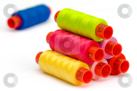 To use this stock image in your creative project, please select the size you need over to the right and click the "Add to Cart" button.
Your downloaded image will come with the Cutcaster watermark removed so don’t worry about the watermark you see on this page. Multicolor yarn bobbins stock photo, Macro picture of yarn bobbins of different colors by Hieng Ling Tie
