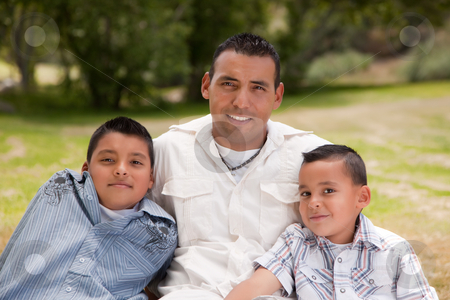 To use this stock image in your creative project, please select the size you need over to the right and click the "Add to Cart" button.
Your downloaded image will come with the Cutcaster watermark removed so don’t worry about the watermark you see on this page. Father and Sons in the Park stock photo, Father and Sons Portrait in the Park. by Andy Dean