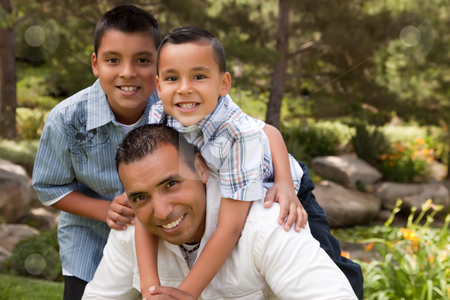 To use this stock image in your creative project, please select the size you need over to the right and click the "Add to Cart" button.
Your downloaded image will come with the Cutcaster watermark removed so don’t worry about the watermark you see on this page. Father and Sons in the Park stock photo, Father and Sons Portrait in the Park. by Andy Dean