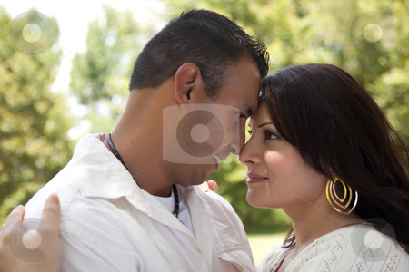 To use this stock image in your creative project, please select the size you need over to the right and click the "Add to Cart" button.
Your downloaded image will come with the Cutcaster watermark removed so don’t worry about the watermark you see on this page. Happy Couple in the Park stock photo, Affectionate Happy Hispanic Couple in the Park. by Andy Dean