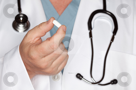 To use this stock image in your creative project, please select the size you need over to the right and click the "Add to Cart" button.
Your downloaded image will come with the Cutcaster watermark removed so don’t worry about the watermark you see on this page. Male Doctor Abstract with Pill stock photo, Male Doctor Abstract with Stethoscope and Pill - Narrow Depth of Field. by Andy Dean
