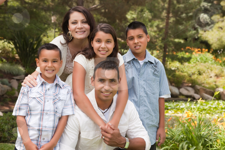 To use this stock image in your creative project, please select the size you need over to the right and click the "Add to Cart" button.
Your downloaded image will come with the Cutcaster watermark removed so don’t worry about the watermark you see on this page. Happy Hispanic Family In the Park stock photo, Happy Hispanic Family Portrait In the Park. by Andy Dean