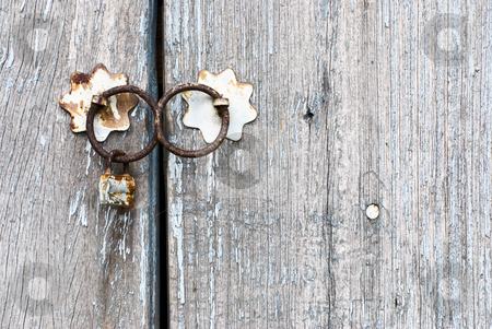 To use this stock image in your creative project, please select the size you need over to the right and click the "Add to Cart" button.
Your downloaded image will come with the Cutcaster watermark removed so don’t worry about the watermark you see on this page. Old chinese door with doorknocker stock photo, Old chinese doorknocker and wooden textured door by Lawren
