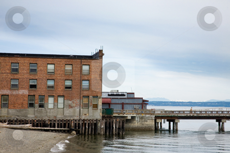 To use this stock image in your creative project, please select the size you need over to the right and click the "Add to Cart" button.
Your downloaded image will come with the Cutcaster watermark removed so don’t worry about the watermark you see on this page. Port Townsend stock photo, Buildings by the water in Port Townsend Washington. by Travis Manley
