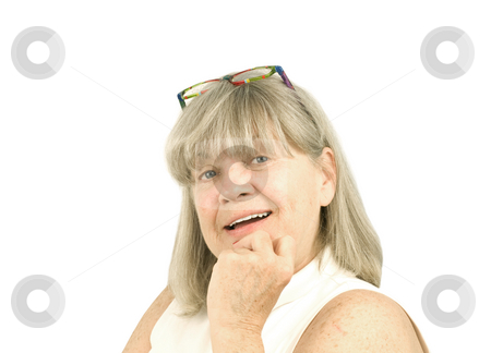 To use this stock image in your creative project, please select the size you need over to the right and click the "Add to Cart" button.
Your downloaded image will come with the Cutcaster watermark removed so don’t worry about the watermark you see on this page. Portrait of smiling senior woman stock photo, Portrait of smiling senior woman on a white background by John Teeter