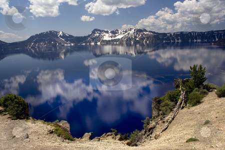 To use this stock image in your creative project, please select the size you need over to the right and click the "Add to Cart" button.
Your downloaded image will come with the Cutcaster watermark removed so don’t worry about the watermark you see on this page. Crater Lake Reflections Oregon stock photo, Reflections Snow Mountains, Crater Lake National Park, Oregon, Northwest by William Perry