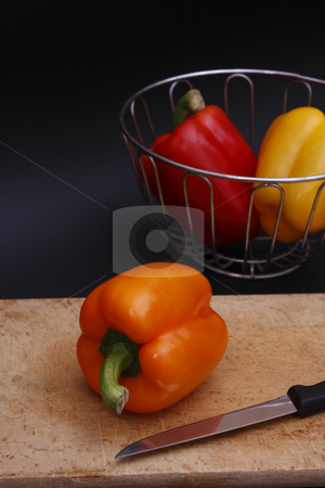 To use this stock image in your creative project, please select the size you need over to the right and click the "Add to Cart" button.
Your downloaded image will come with the Cutcaster watermark removed so don’t worry about the watermark you see on this page. Chopping peppers stock photo, Bell pepper on chopping board by Torsten Lorenz