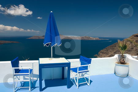 To use this stock image in your creative project, please select the size you need over to the right and click the "Add to Cart" button.
Your downloaded image will come with the Cutcaster watermark removed so don’t worry about the watermark you see on this page. Summer blue balcony stock photo, Beautiful view from balcony on the Santorini volcano by Wiktor Bubniak