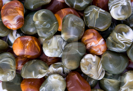 To use this stock image in your creative project, please select the size you need over to the right and click the "Add to Cart" button.
Your downloaded image will come with the Cutcaster watermark removed so don’t worry about the watermark you see on this page. Heap of decorative stones stock photo, Stack of decorative shining colorful pebbles by Wiktor Bubniak