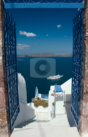 To use this stock image in your creative project, please select the size you need over to the right and click the "Add to Cart" button.
Your downloaded image will come with the Cutcaster watermark removed so don’t worry about the watermark you see on this page. Welcome in Santorini stock photo, Open gates invites you to explore Santorini island by Wiktor Bubniak