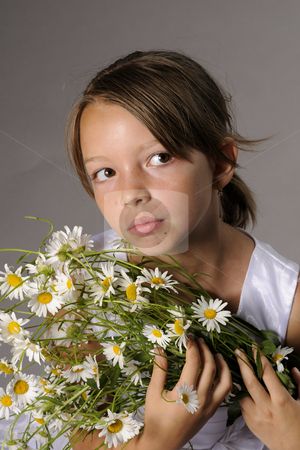 To use this stock image in your creative project, please select the size you need over to the right and click the "Add to Cart" button.
Your downloaded image will come with the Cutcaster watermark removed so don’t worry about the watermark you see on this page. Beautiful girl stock photo, Cute girl with flowers by Dragos Iliescu