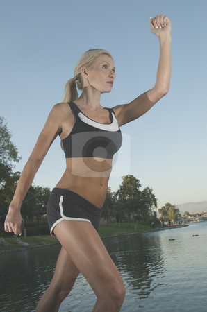 To use this stock image in your creative project, please select the size you need over to the right and click the "Add to Cart" button.
Your downloaded image will come with the Cutcaster watermark removed so don’t worry about the watermark you see on this page. Woman Jogging stock photo, by Timothy OLeary