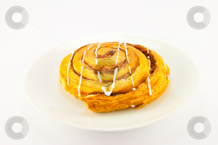 To use this stock image in your creative project, please select the size you need over to the right and click the "Add to Cart" button.
Your downloaded image will come with the Cutcaster watermark removed so don’t worry about the watermark you see on this page. Cinnamon Bun stock photo, Single cinnamon bun with clipping path on a white background by Keith Wilson