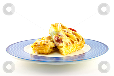 To use this stock image in your creative project, please select the size you need over to the right and click the "Add to Cart" button.
Your downloaded image will come with the Cutcaster watermark removed so don’t worry about the watermark you see on this page. Raspberry Danish on a Plate stock photo, Raspberry and custard danish on a blue and white plate on a white background by Keith Wilson