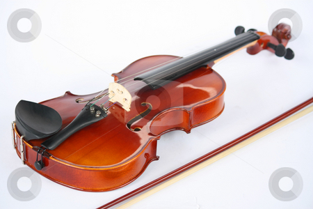 To use this stock image in your creative project, please select the size you need over to the right and click the "Add to Cart" button.
Your downloaded image will come with the Cutcaster watermark removed so don’t worry about the watermark you see on this page. Violin stock photo, A violin isolated on a white background by Claro Alindogan