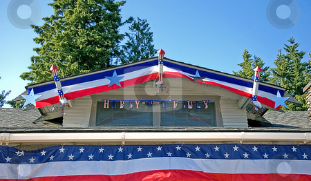 To use this stock image in your creative project, please select the size you need over to the right and click the "Add to Cart" button.
Your downloaded image will come with the Cutcaster watermark removed so don’t worry about the watermark you see on this page. House Roof Decorated 4th Of July stock photo, This house roof is decorated with red, white and blue for 4th Of July celebration. by Valerie Garner