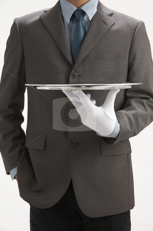 To use this stock image in your creative project, please select the size you need over to the right and click the "Add to Cart" button.
Your downloaded image will come with the Cutcaster watermark removed so don’t worry about the watermark you see on this page. Sale person holding a tray stock photo, Asale person holding a sliver empty tray by eskaylim