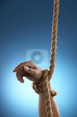 To use this stock image in your creative project, please select the size you need over to the right and click the "Add to Cart" button.
Your downloaded image will come with the Cutcaster watermark removed so don’t worry about the watermark you see on this page. Hang tight by rope stock photo, Hand being tight by rope asking for help by eskaylim