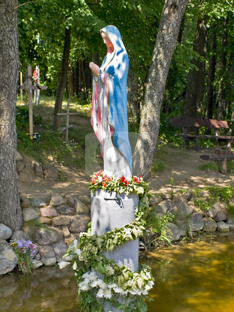 To use this stock image in your creative project, please select the size you need over to the right and click the "Add to Cart" button.
Your downloaded image will come with the Cutcaster watermark removed so don’t worry about the watermark you see on this page. Figure stock photo, Virgin Mary figure in the water by Sergej Razvodovskij