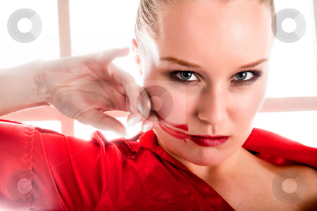 To use this stock image in your creative project, please select the size you need over to the right and click the "Add to Cart" button.
Your downloaded image will come with the Cutcaster watermark removed so don’t worry about the watermark you see on this page. Stylish woman in red and black stock photo, Fresh colored portrait of a stylish woman by Frenk and Danielle Kaufmann